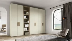 Armadio con ante battenti a prezzo scontato modello Armadio con libreria centrale colore perla opaco di dalcin in promo-sconto del 50% di^Dal Cin Best