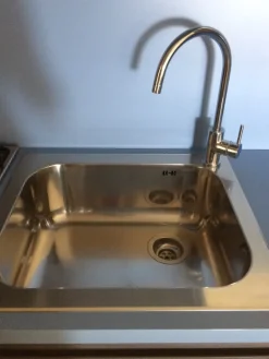 Dibiesse Cucina con penisola in laminato materico a prezzo ribassato 45%- Cucine Con Penisola|Cucine Moderne